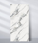 White marble wall panel with bold gray veining and luxury stone finish