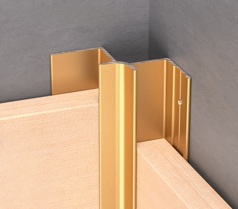 Gold 3mm aluminum inside corner trim installed between two panels at an internal wall corner
