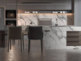 Modern kitchen with white marble wall panels and marble island backsplash