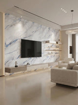 Modern living room TV wall finished with white 3D Bluewave PVC marble sheets and blue-gray veining