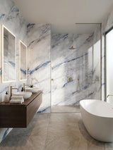 Waterproof 3D Bluewave PVC marble sheets installed across bathroom and shower walls