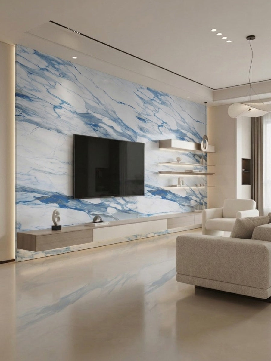 Modern living room media wall clad in white and blue-veined Calacatta Azur PVC panels
