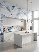 Bright modern kitchen with Calacatta Azur PVC wall panels and a matching blue-veined backsplash