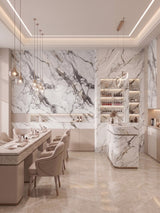 White PVC marble sheets with bold gray veining installed on dining room walls and a central counter