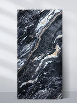 3D Doral Night marble PVC wall panel in a 4 x 8 ft sheet with sweeping black, white, gray and gold veining