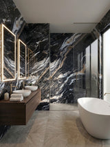 Doral Night marble PVC wall panels with bold white and gold veining surrounding a bathroom vanity and glass shower