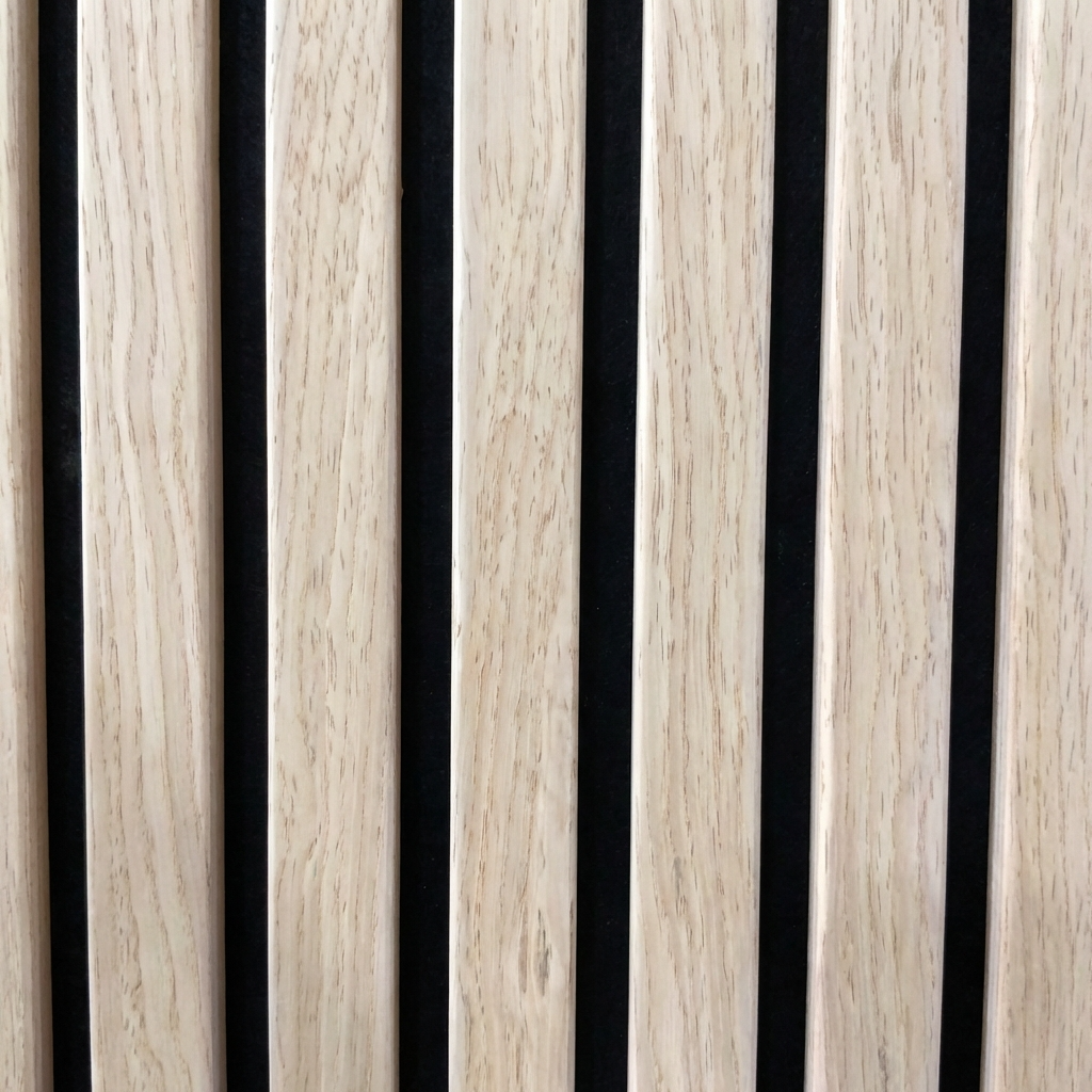 Close-up of light Nordic birch slats with natural grain and black backing