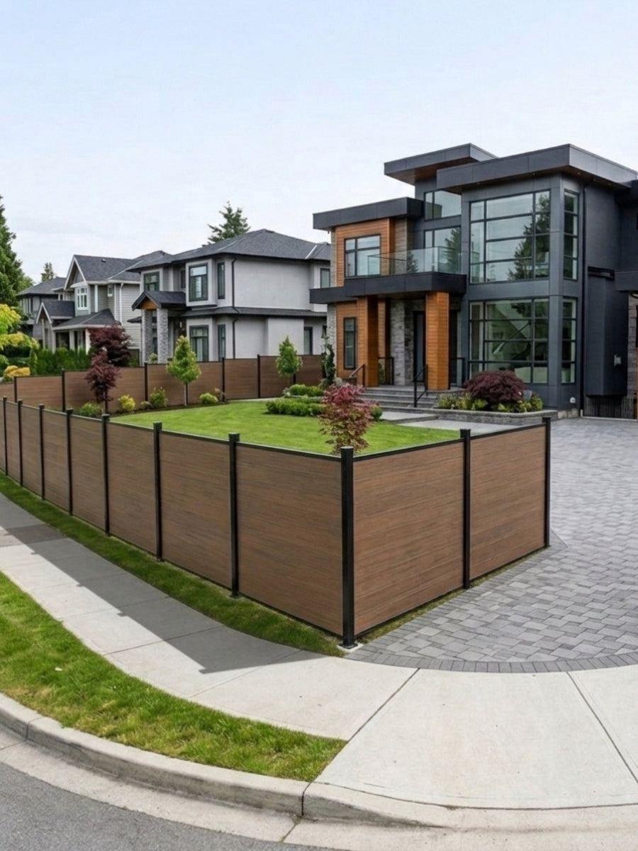 Walnut composite fence wrapping a corner lot around a landscaped modern home