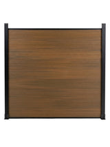 Front view of walnut composite fence panel framed by two black posts