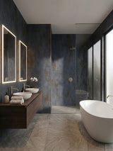 Waterproof dark charcoal stone panels lining a modern bathroom and walk-in shower