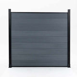 Dark gray composite fence with wood grain texture, horizontal planks, and black metal posts, available in NJ