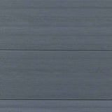 Light gray composite fence with co-extrusion design, durable and stylish, perfect for NJ homes, resembling blue wooden plank