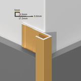 Gold aluminum end cap trim fitted to a white PVC wall panel corner with profile dimensions
