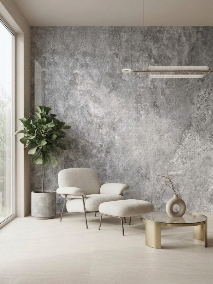 Gray stone-textured PVC sheets installed as a feature wall in a modern seating area