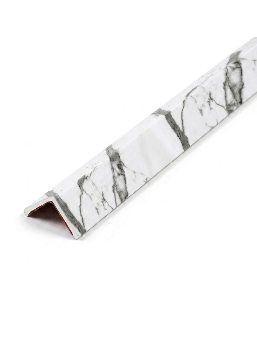 White marble-look corner trim with gray veining for acoustic and fluted wall panels
