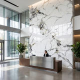 Glossy Glacier Vein marble-look PVC wall panels installed floor to ceiling behind a modern reception desk