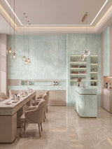 Pale green travertine-look PVC wall panels in a contemporary salon interior