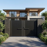 Modern house with a black gate and surrounding greenery