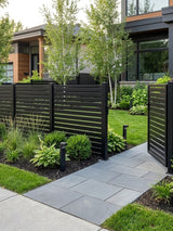 Black aluminum semi privacy fence with an open horizontal-slat gate in a landscaped front yard