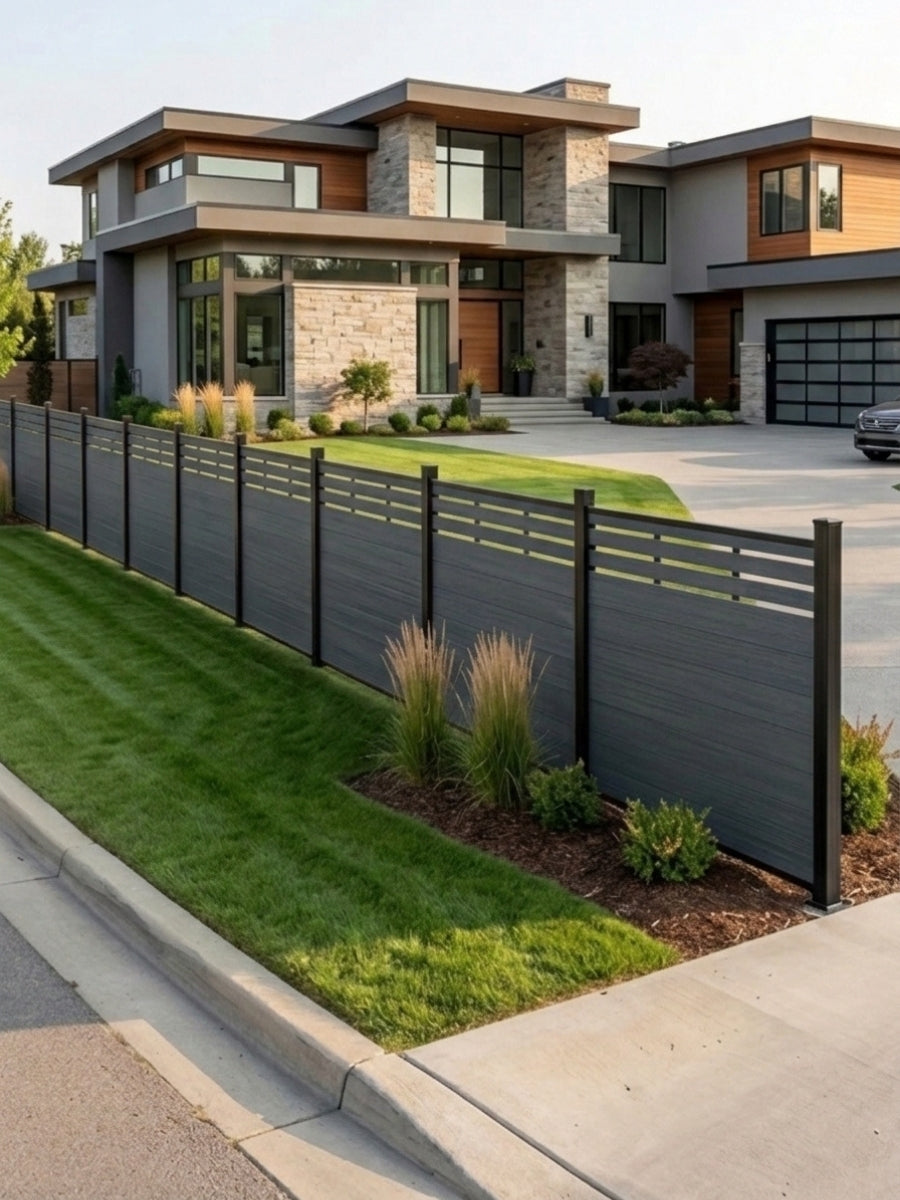 Long lattice-top composite fence bordering the lawn of a modern home