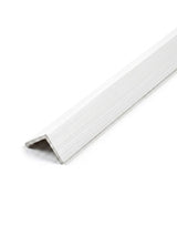 Close-up of white brushed L-shaped trim for WPC fluted 3D wall panels