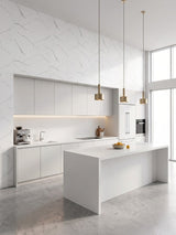 White Gray Pearl Marble PVC wall panels above sleek white cabinets and an island in a bright modern kitchen.