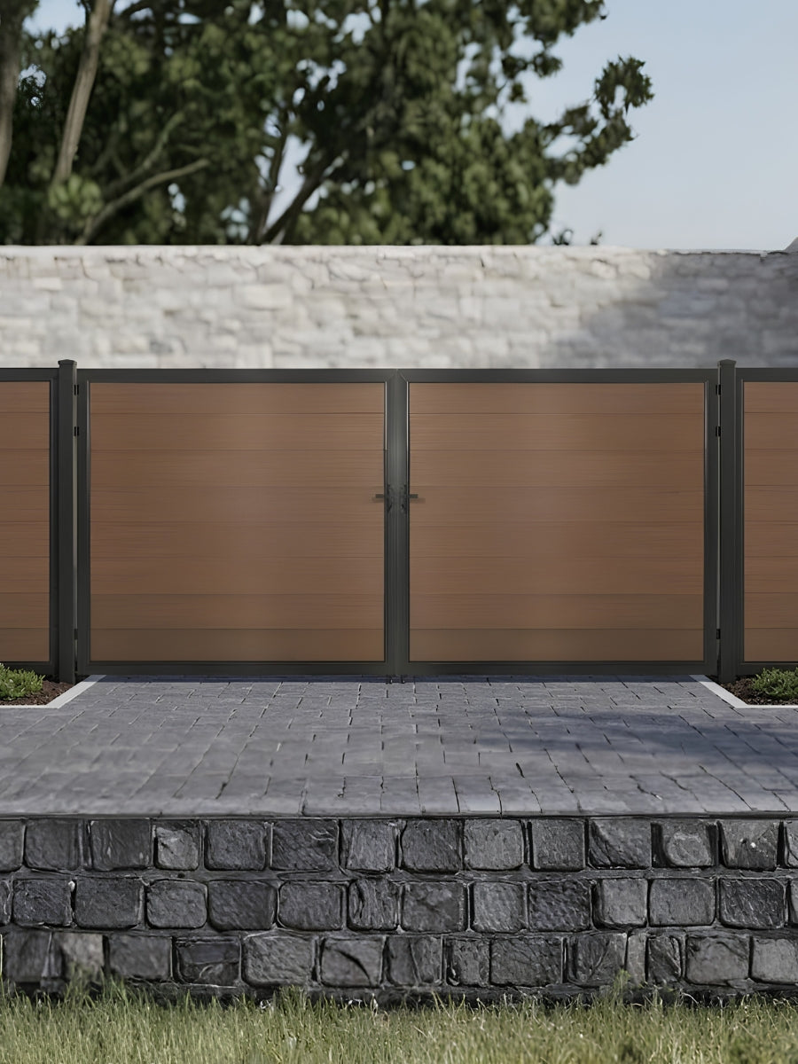 12ft x 6ft brown wood-grain WPC double fence gate with black metal frame installed along a modern outdoor privacy fence.