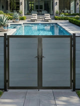 8ft x 6ft gray WPC double fence gate with horizontal panels and black frame installed beside a modern backyard pool