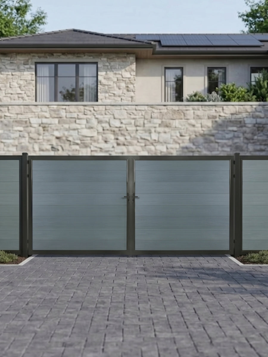 12ft x 6ft gray WPC double fence gate with black metal frame installed across a modern residential driveway.