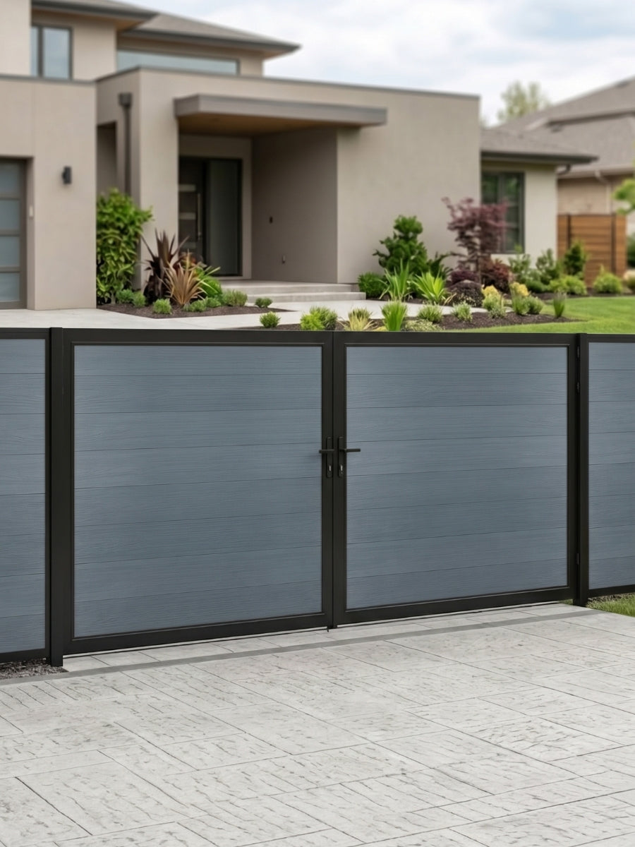 12ft x 6ft gray WPC double fence gate with black metal frame installed at a modern residential driveway.