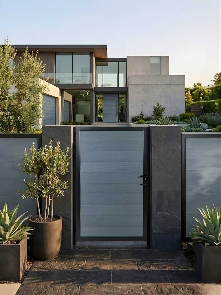 Gray WPC Fence Gate Single 4ft x 6ft installed in a modern residential privacy fence with black frame and keyed handle.
