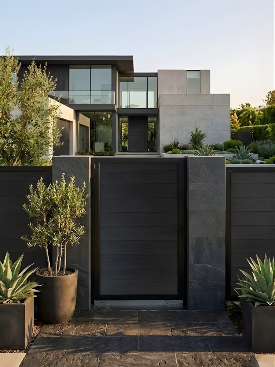 Black WPC Fence Gate Single 4ft x 6ft installed at the entrance of a modern home with matching horizontal privacy fence panels.